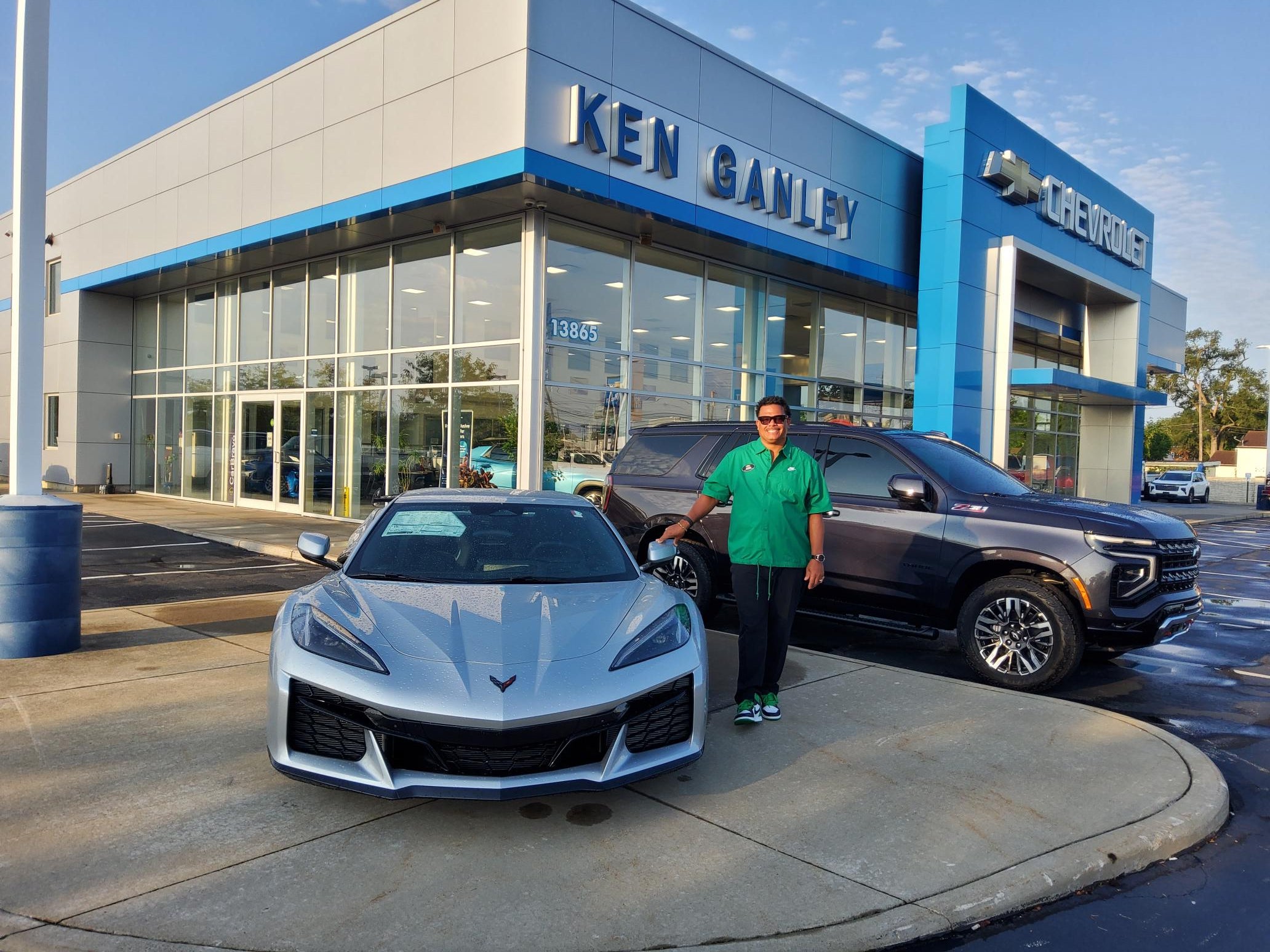 Jason Rush with a car in front of Ken Ganley Chevrolet Brook Park.